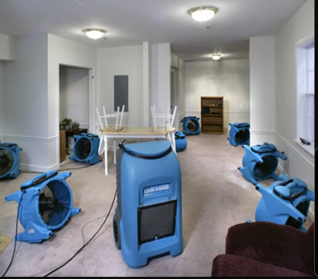 Air movers and dehumidifier setup for Water Damage Restoration in Hilo